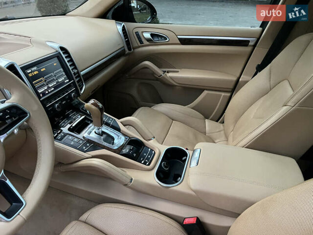 Черный Порше Каен, объемом двигателя 3.6 л и пробегом 274 тыс. км за 24950 $, фото 138 на Automoto.ua