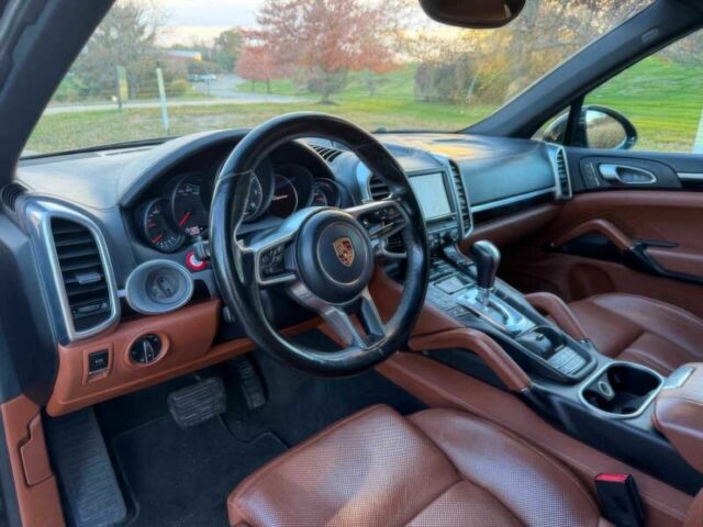 Черный Порше Каен, объемом двигателя 3.6 л и пробегом 74 тыс. км за 10000 $, фото 10 на Automoto.ua