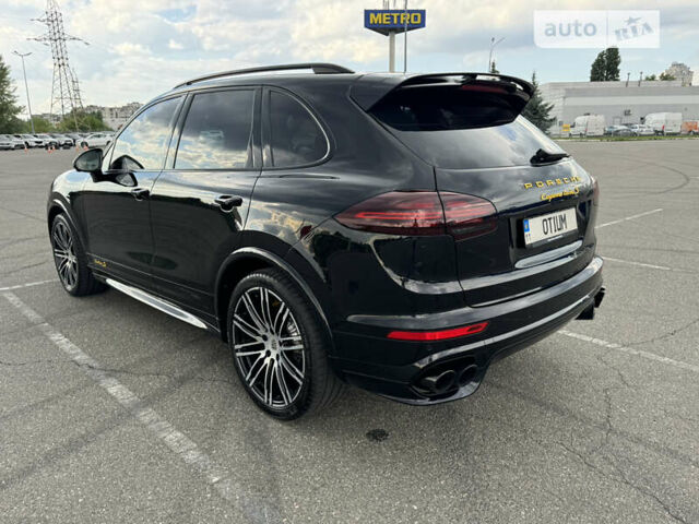 Черный Порше Каен, объемом двигателя 4.81 л и пробегом 100 тыс. км за 51000 $, фото 2 на Automoto.ua