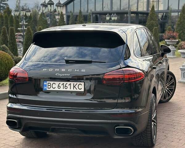 Черный Порше Каен, объемом двигателя 3.6 л и пробегом 64 тыс. км за 28999 $, фото 121 на Automoto.ua