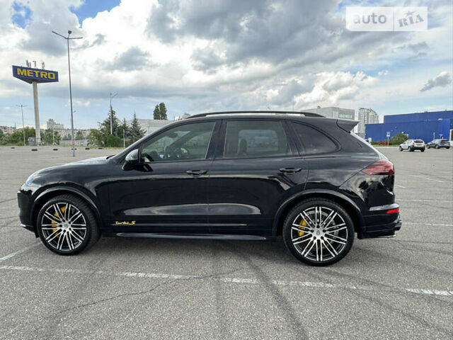 Черный Порше Каен, объемом двигателя 4.81 л и пробегом 100 тыс. км за 51000 $, фото 1 на Automoto.ua