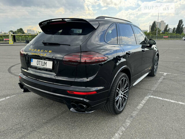 Черный Порше Каен, объемом двигателя 4.81 л и пробегом 100 тыс. км за 51000 $, фото 4 на Automoto.ua