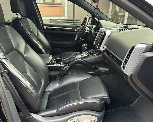 Черный Порше Каен, объемом двигателя 3.6 л и пробегом 64 тыс. км за 28999 $, фото 62 на Automoto.ua