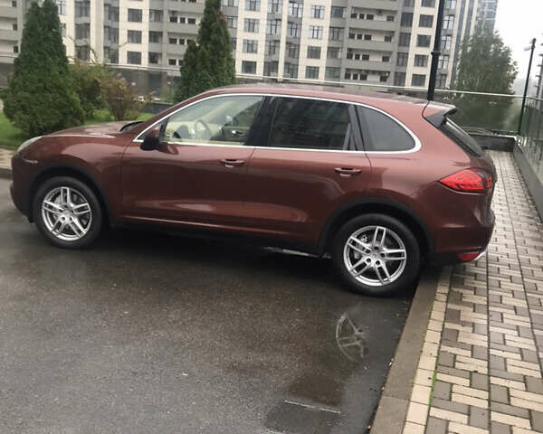 Коричневий Порше Cayenne, об'ємом двигуна 4.81 л та пробігом 142 тис. км за 18000 $, фото 1 на Automoto.ua