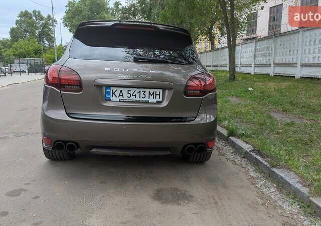 Коричневый Порше Каен, объемом двигателя 4.81 л и пробегом 90 тыс. км за 30000 $, фото 5 на Automoto.ua