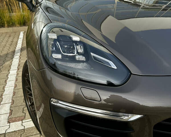 Коричневый Порше Каен, объемом двигателя 2.97 л и пробегом 141 тыс. км за 49900 $, фото 2 на Automoto.ua