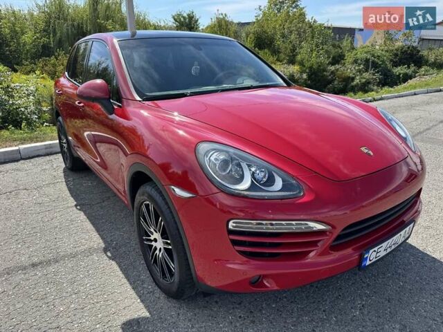 Красный Порше Каен, объемом двигателя 3 л и пробегом 143 тыс. км за 25500 $, фото 1 на Automoto.ua