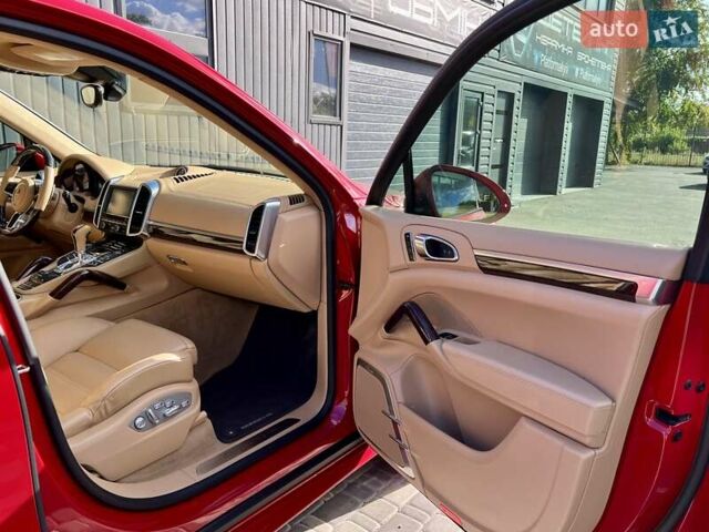 Красный Порше Каен, объемом двигателя 4.81 л и пробегом 99 тыс. км за 31900 $, фото 54 на Automoto.ua