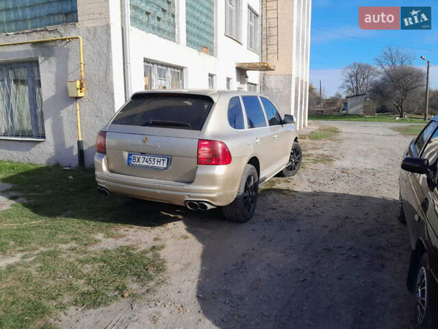 Желтый Порше Каен, объемом двигателя 4.51 л и пробегом 232 тыс. км за 10500 $, фото 1 на Automoto.ua