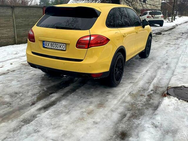 Жовтий Порше Cayenne, об'ємом двигуна 3 л та пробігом 257 тис. км за 21999 $, фото 1 на Automoto.ua