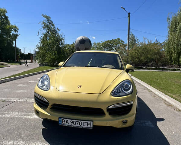 Жовтий Порше Cayenne, об'ємом двигуна 3 л та пробігом 220 тис. км за 16000 $, фото 1 на Automoto.ua