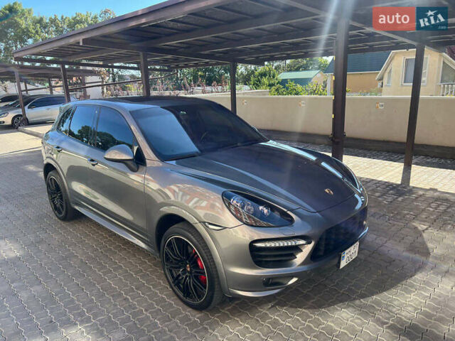 Серый Порше Каен, объемом двигателя 4.81 л и пробегом 145 тыс. км за 26000 $, фото 2 на Automoto.ua