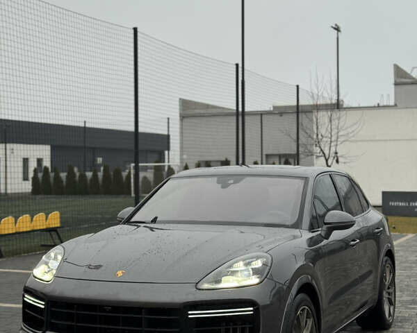 Серый Порше Каен, объемом двигателя 4 л и пробегом 74 тыс. км за 69900 $, фото 1 на Automoto.ua