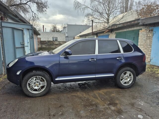 Синий Порше Каен, объемом двигателя 4.5 л и пробегом 298 тыс. км за 6491 $, фото 1 на Automoto.ua