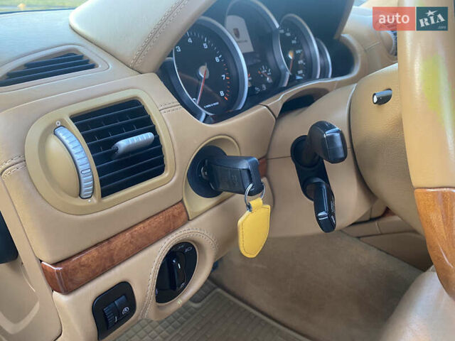 Синий Порше Каен, объемом двигателя 4.81 л и пробегом 115 тыс. км за 15500 $, фото 17 на Automoto.ua