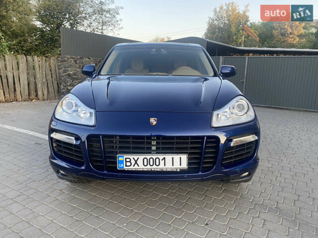 Синий Порше Каен, объемом двигателя 4.81 л и пробегом 115 тыс. км за 15500 $, фото 1 на Automoto.ua