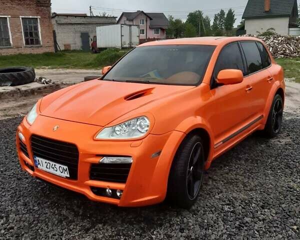 Помаранчевий Порше Cayenne, об'ємом двигуна 4.81 л та пробігом 83 тис. км за 23150 $, фото 1 на Automoto.ua