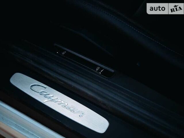 Белый Порше Кайман, объемом двигателя 2 л и пробегом 7 тыс. км за 54400 $, фото 8 на Automoto.ua