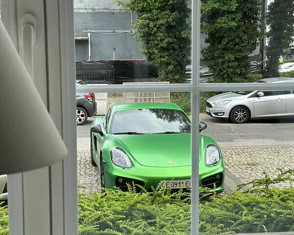 Зеленый Порше Кайман, объемом двигателя 2.71 л и пробегом 70 тыс. км за 37100 $, фото 4 на Automoto.ua