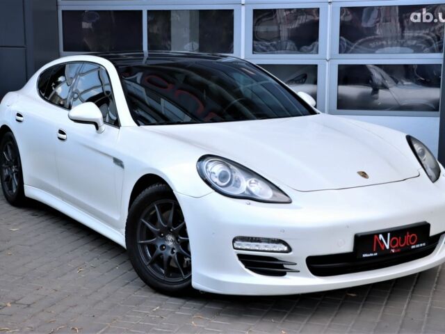 Белый Порше Панамера, объемом двигателя 4.8 л и пробегом 122 тыс. км за 18900 $, фото 1 на Automoto.ua