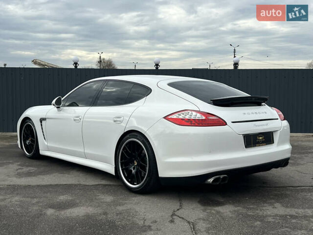 Белый Порше Панамера, объемом двигателя 4.81 л и пробегом 168 тыс. км за 21900 $, фото 3 на Automoto.ua