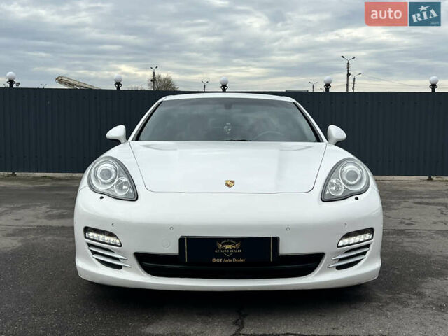 Белый Порше Панамера, объемом двигателя 4.81 л и пробегом 168 тыс. км за 21900 $, фото 1 на Automoto.ua