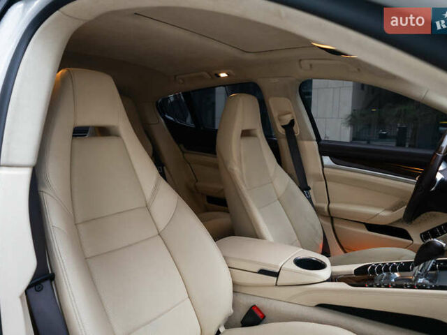 Белый Порше Панамера, объемом двигателя 4.81 л и пробегом 129 тыс. км за 26000 $, фото 64 на Automoto.ua