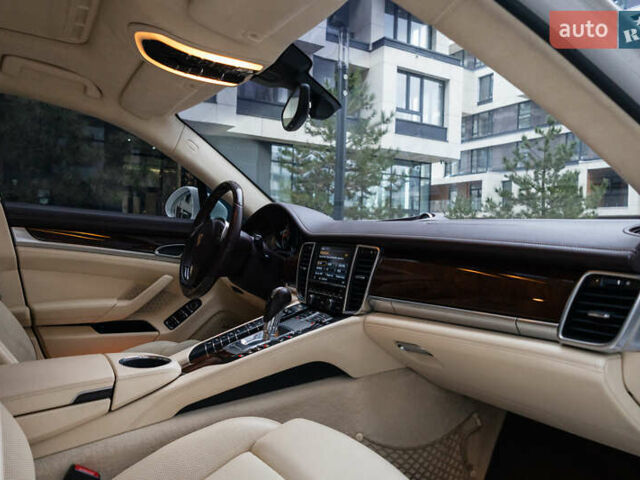 Белый Порше Панамера, объемом двигателя 4.81 л и пробегом 129 тыс. км за 26000 $, фото 63 на Automoto.ua