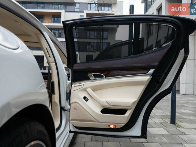 Белый Порше Панамера, объемом двигателя 4.81 л и пробегом 129 тыс. км за 26000 $, фото 37 на Automoto.ua