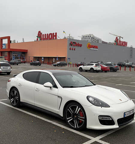 Белый Порше Панамера, объемом двигателя 4.81 л и пробегом 105 тыс. км за 25000 $, фото 1 на Automoto.ua