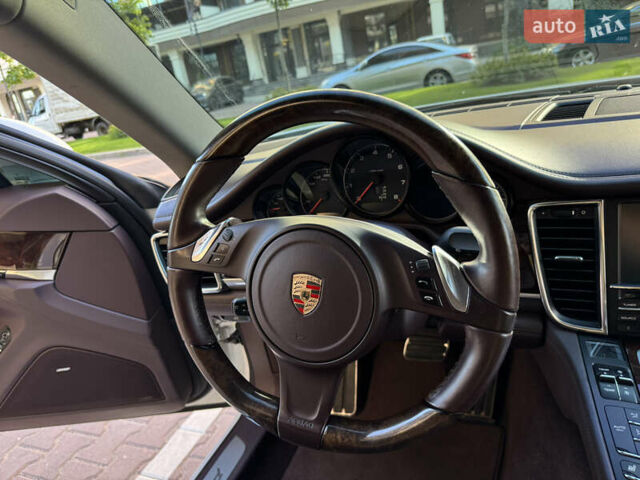 Білий Порше Panamera, об'ємом двигуна 3.61 л та пробігом 65 тис. км за 29999 $, фото 1 на Automoto.ua