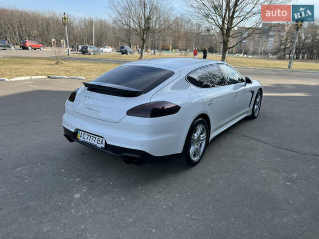 Білий Порше Panamera, об'ємом двигуна 3 л та пробігом 103 тис. км за 27600 $, фото 14 на Automoto.ua