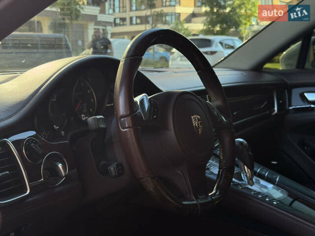 Білий Порше Panamera, об'ємом двигуна 3.61 л та пробігом 65 тис. км за 29999 $, фото 30 на Automoto.ua