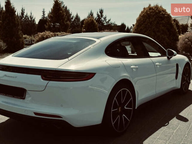 Белый Порше Панамера, объемом двигателя 3 л и пробегом 101 тыс. км за 48999 $, фото 2 на Automoto.ua