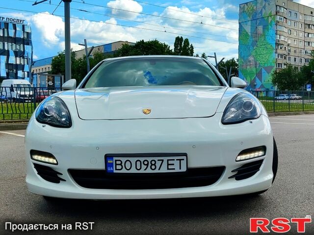 Белый Порше Панамера, объемом двигателя 4.8 л и пробегом 208 тыс. км за 21000 $, фото 2 на Automoto.ua