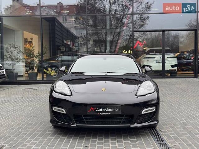 Черный Порше Панамера, объемом двигателя 4.81 л и пробегом 133 тыс. км за 15900 $, фото 1 на Automoto.ua