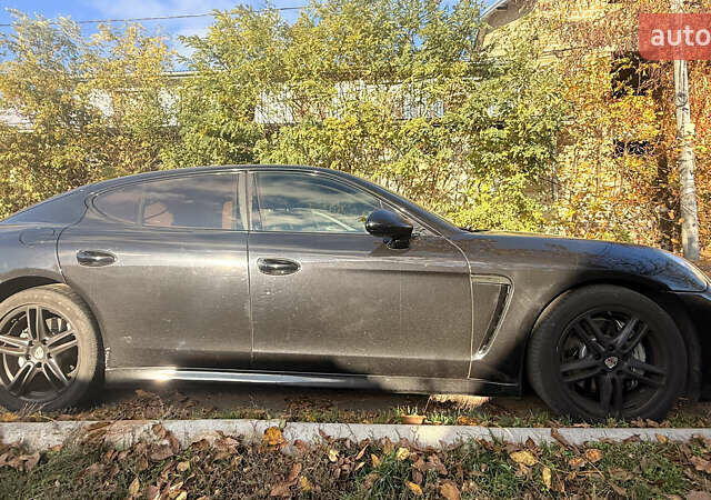 Черный Порше Панамера, объемом двигателя 4.8 л и пробегом 153 тыс. км за 16500 $, фото 2 на Automoto.ua