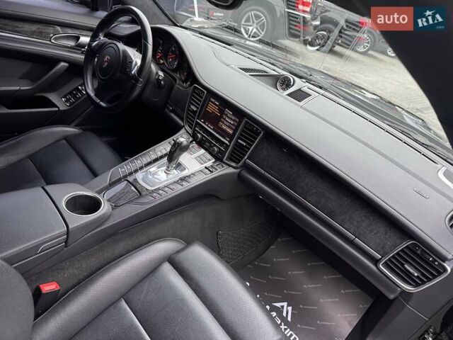 Черный Порше Панамера, объемом двигателя 4.81 л и пробегом 133 тыс. км за 15900 $, фото 16 на Automoto.ua