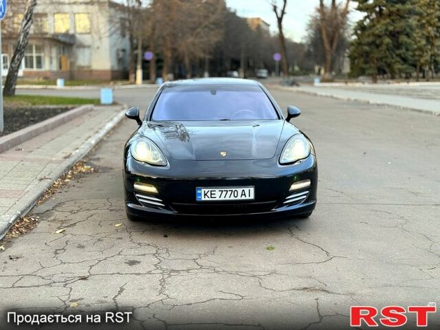 Чорний Порше Panamera, об'ємом двигуна 4.8 л та пробігом 143 тис. км за 31500 $, фото 1 на Automoto.ua