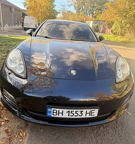 Черный Порше Панамера, объемом двигателя 4.8 л и пробегом 153 тыс. км за 16500 $, фото 1 на Automoto.ua
