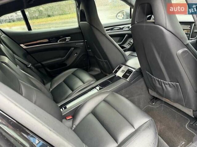 Черный Порше Панамера, объемом двигателя 4.81 л и пробегом 143 тыс. км за 38586 $, фото 4 на Automoto.ua