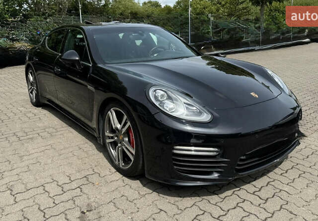 Черный Порше Панамера, объемом двигателя 4.81 л и пробегом 120 тыс. км за 37900 $, фото 1 на Automoto.ua