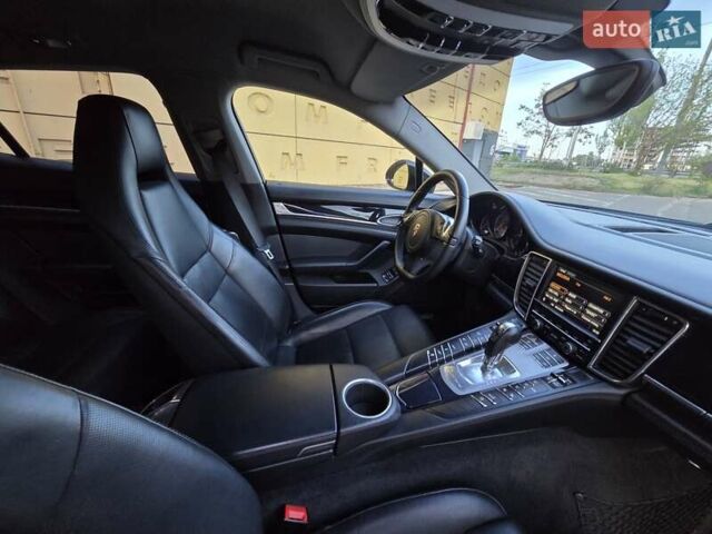 Черный Порше Панамера, объемом двигателя 4.81 л и пробегом 82 тыс. км за 22900 $, фото 19 на Automoto.ua