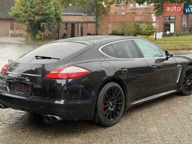 Черный Порше Панамера, объемом двигателя 4.81 л и пробегом 143 тыс. км за 38586 $, фото 3 на Automoto.ua