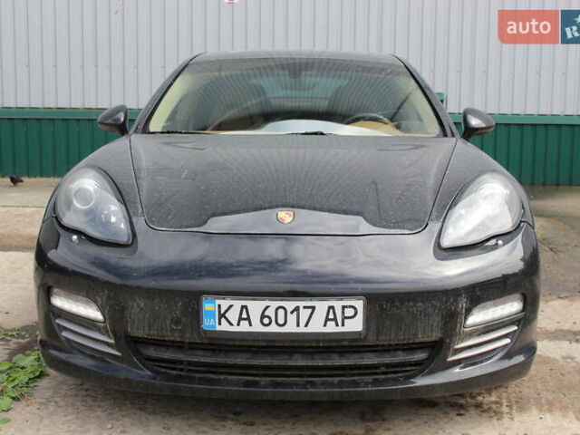 Черный Порше Панамера, объемом двигателя 4.81 л и пробегом 92 тыс. км за 18999 $, фото 1 на Automoto.ua
