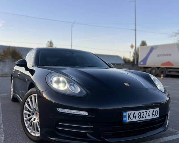 Черный Порше Панамера, объемом двигателя 3.6 л и пробегом 108 тыс. км за 27800 $, фото 1 на Automoto.ua