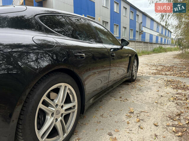 Чорний Порше Panamera, об'ємом двигуна 3.61 л та пробігом 139 тис. км за 39000 $, фото 9 на Automoto.ua