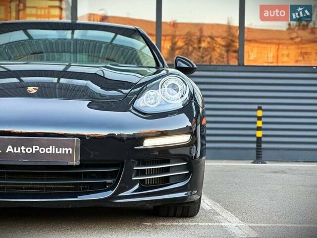 Чорний Порше Panamera, об'ємом двигуна 3 л та пробігом 101 тис. км за 28500 $, фото 2 на Automoto.ua