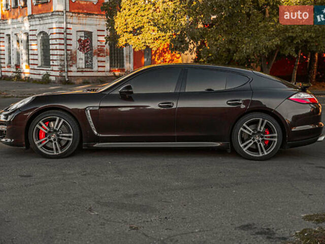 Красный Порше Панамера, объемом двигателя 4.81 л и пробегом 153 тыс. км за 25555 $, фото 5 на Automoto.ua