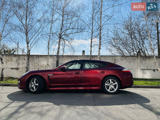 Красный Порше Панамера, объемом двигателя 3.6 л и пробегом 161 тыс. км за 29000 $, фото 1 на Automoto.ua